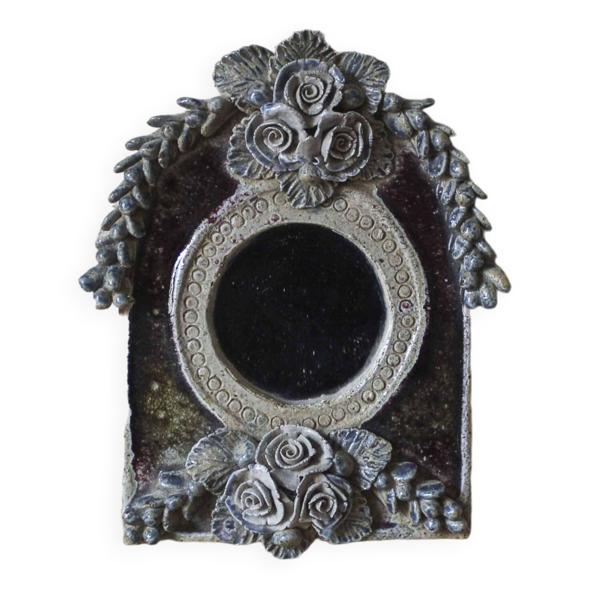 Ceramic mirror decorated with flowers