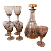 Vintage liqueur service, carafe and 7 amber brown glasses with gold edging