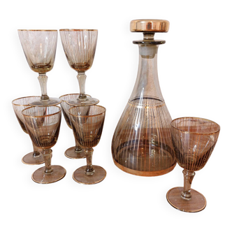 Vintage liqueur service, carafe and 7 amber brown glasses with gold edging