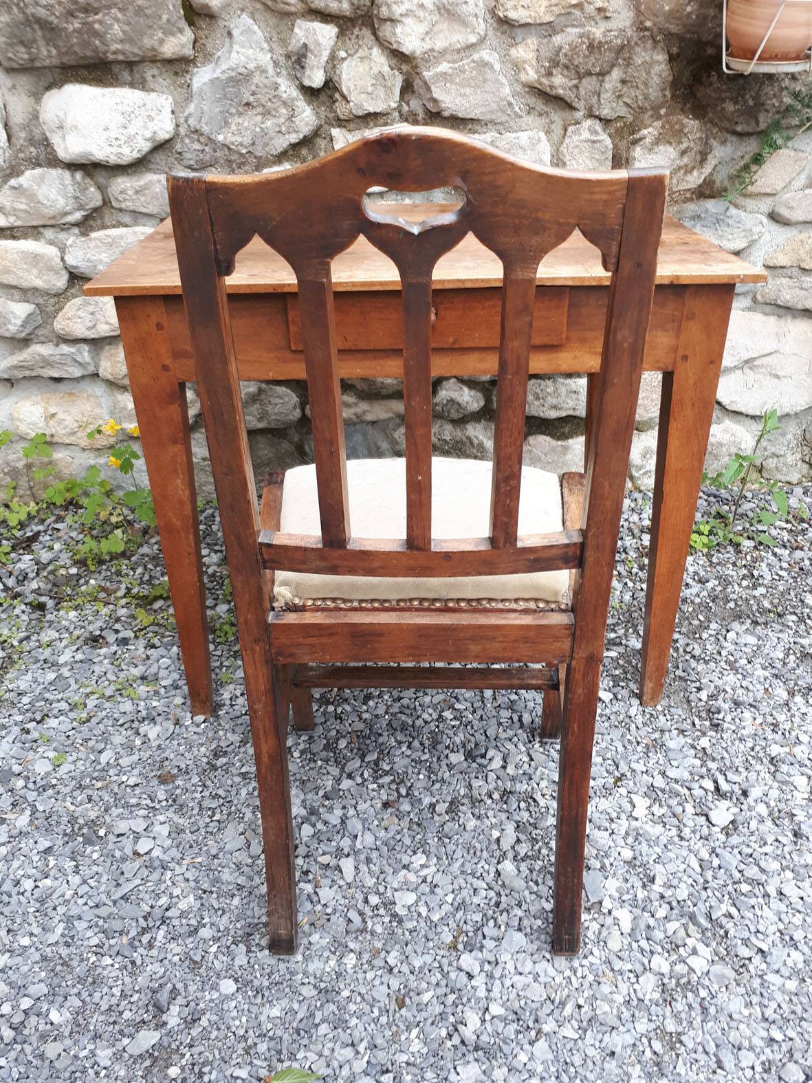 Antique walnut table and chair.