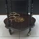 Marquetry trolley on wheels
