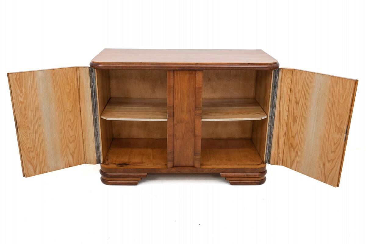 Art Deco style walnut chest of drawers, Poland, 1950s.