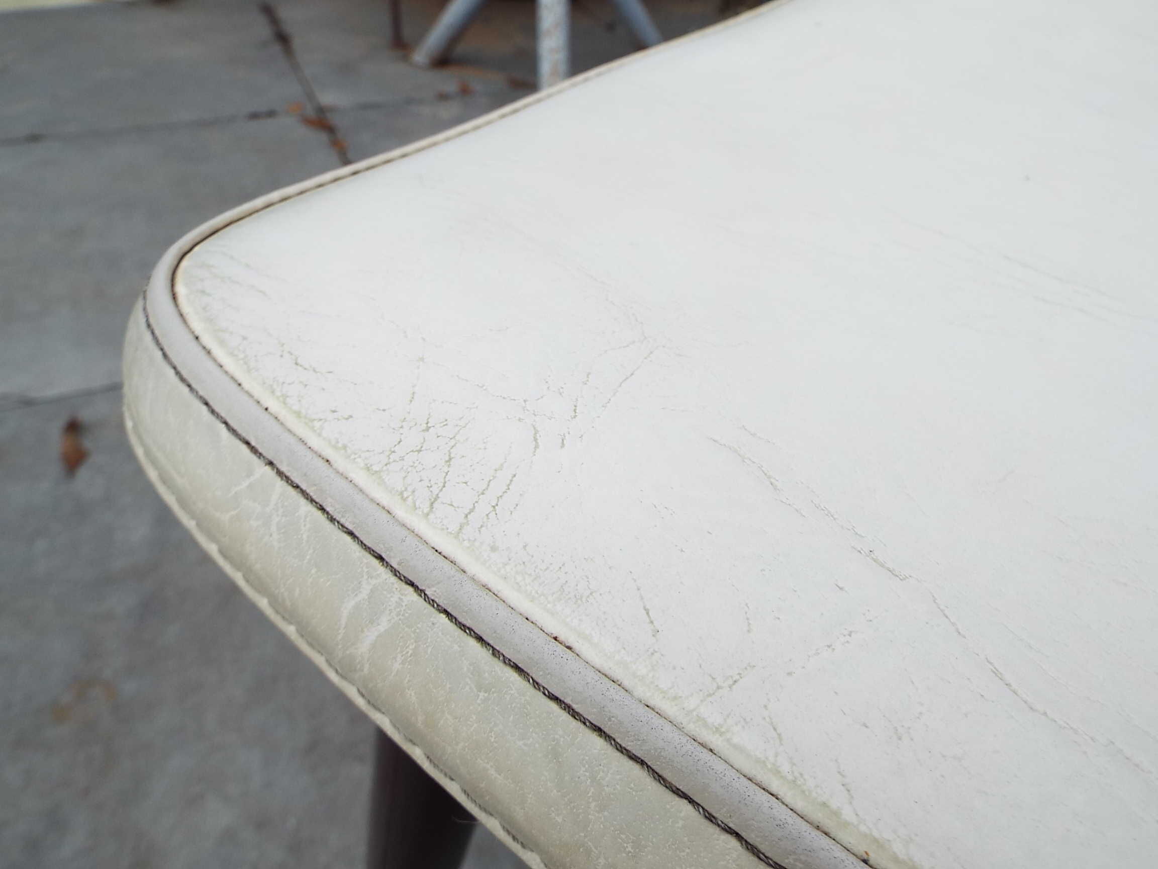 2 skai and wooden chairs