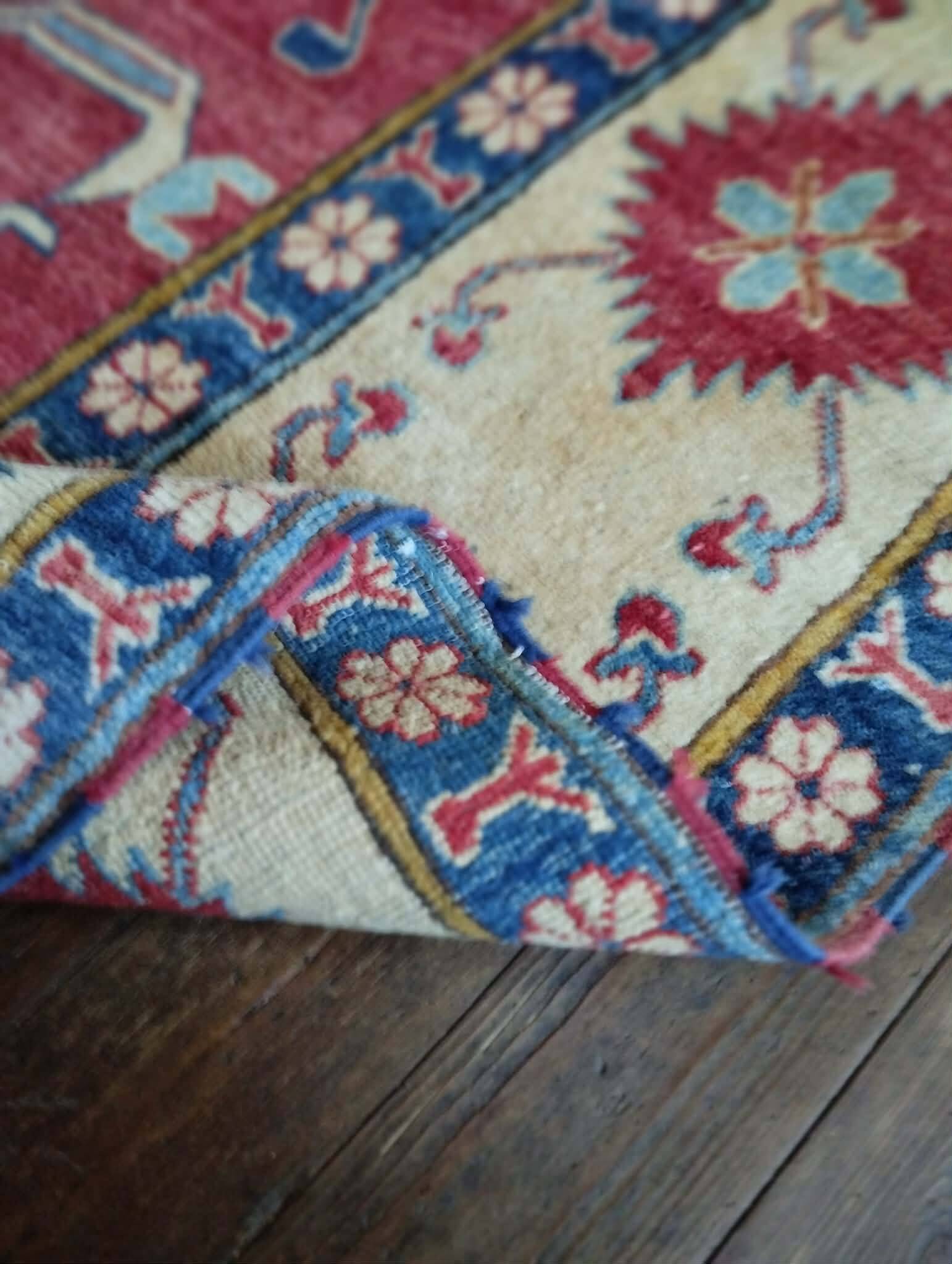 Handmade Pakistani Kazak rug 303x225cm