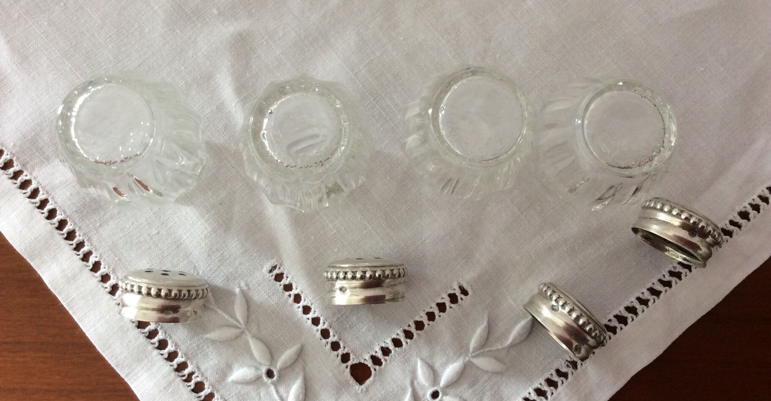 Lot of 4 Christofle crystal salerons, silver cap