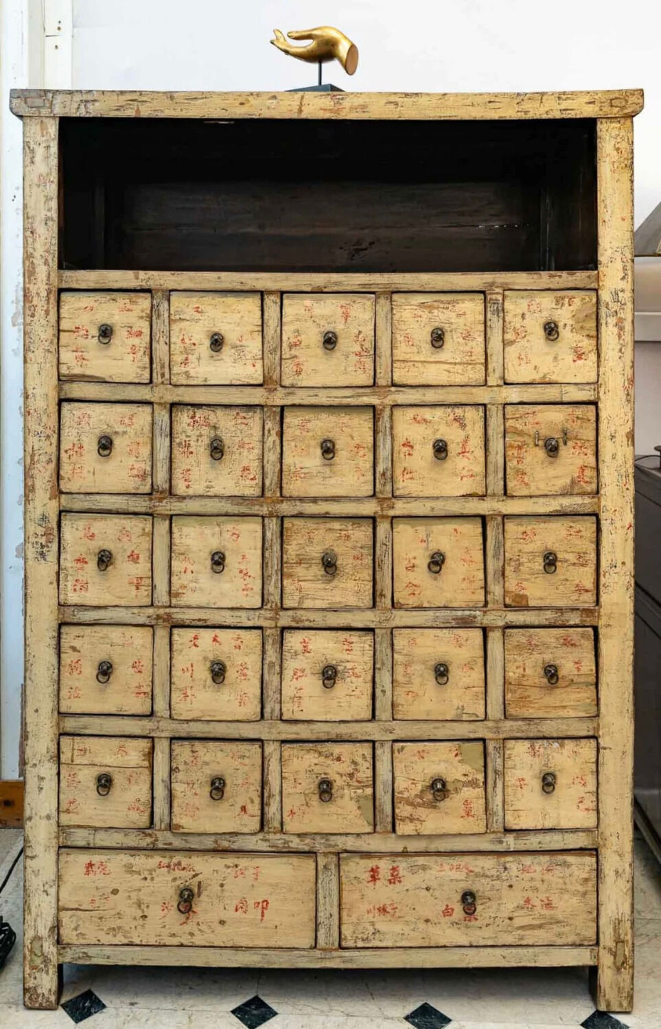 Antique Chinese apothecary cabinet with calligraphy