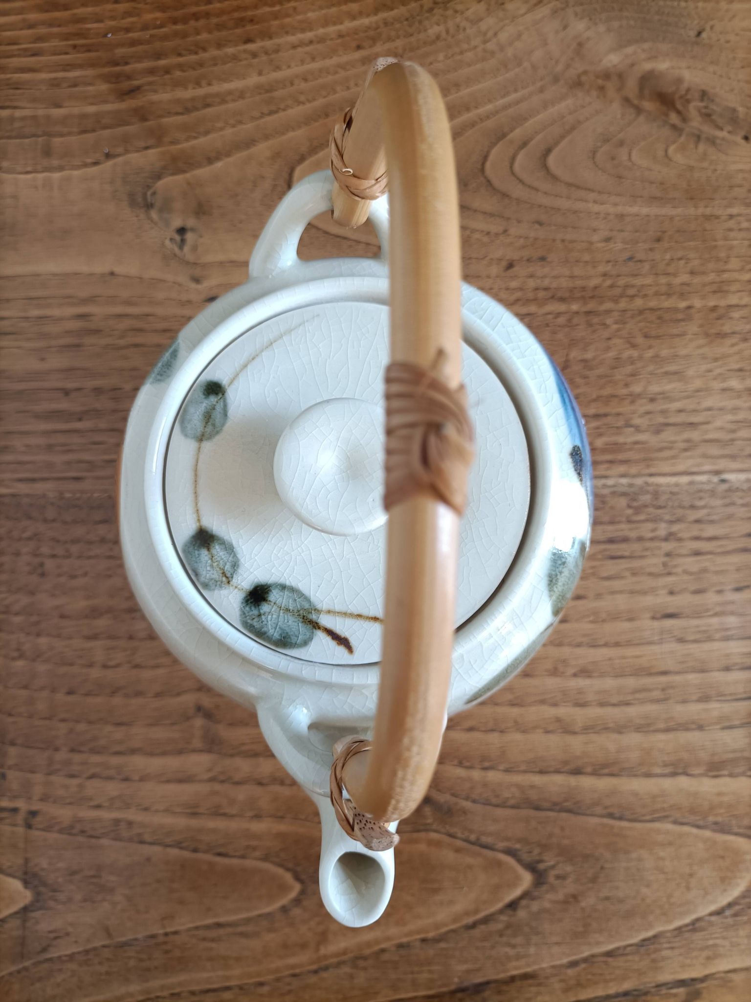 Asian style teapot with bamboo handle