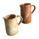 Set of 2 enamelled stoneware jugs