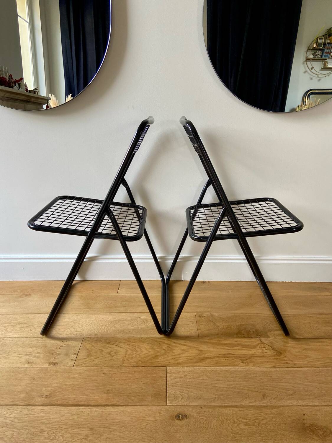 Pair of black lacquered metal "Ted Ned" chairs by Niels Gammelgaard, circa 1970-1980