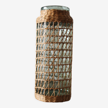 Glass and wicker vase