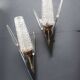 Pair of antique tulip arrow wall sconces