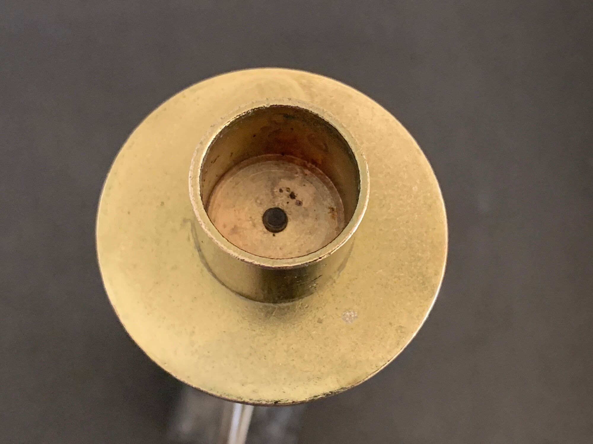 Swedish design candle holder in granite, metal and brass, 1980, height 39 cm