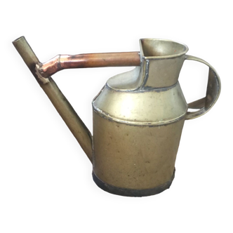 Old watering can