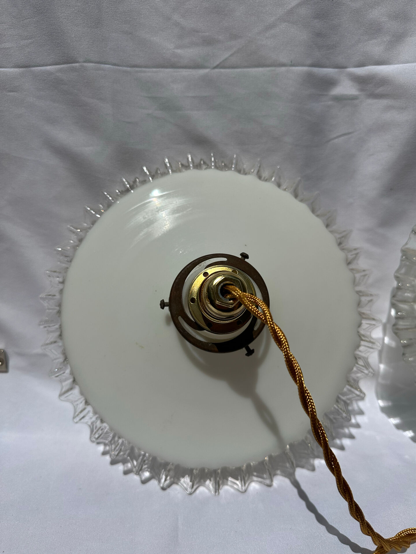 Vintage wavy opaline suspension pair with brass claw