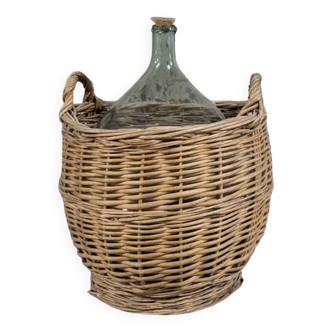 Demijohn with her basket