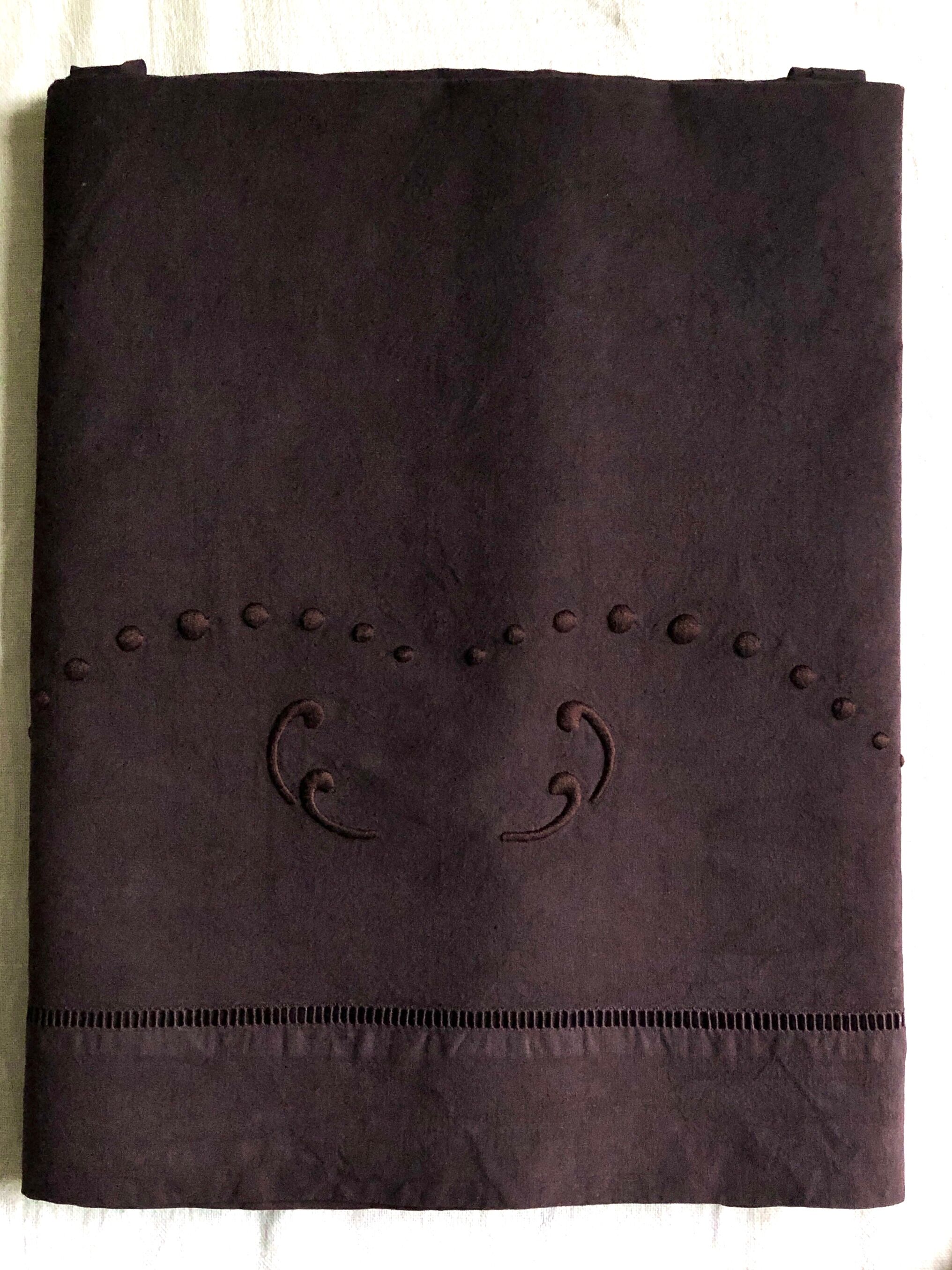 Old linen and cotton sheet tinted eggplant