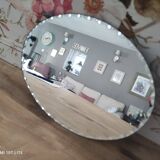 Old beveled oval mirror to pose