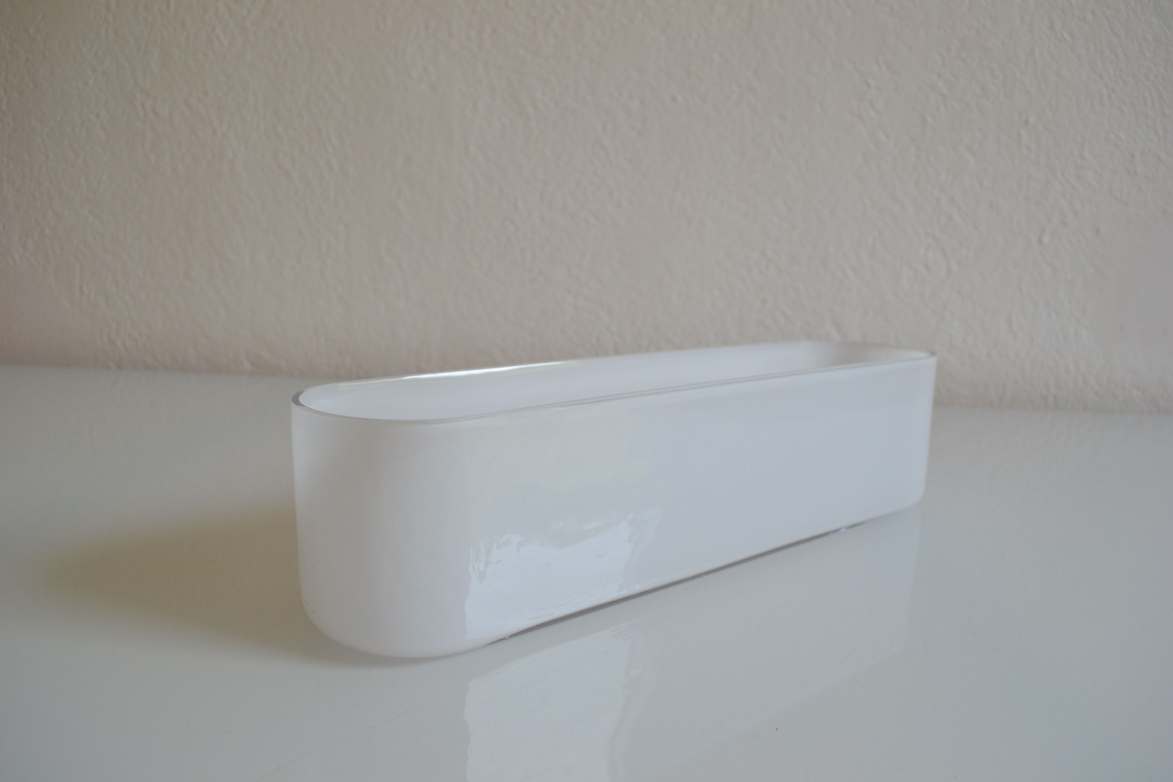 Modernist vase or centerpiece in white glass