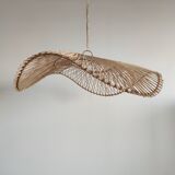 Rattan suspension or lighting fixture in the shape of an undulating circular tray with lattices