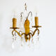 Pair of golden sconces with tassels