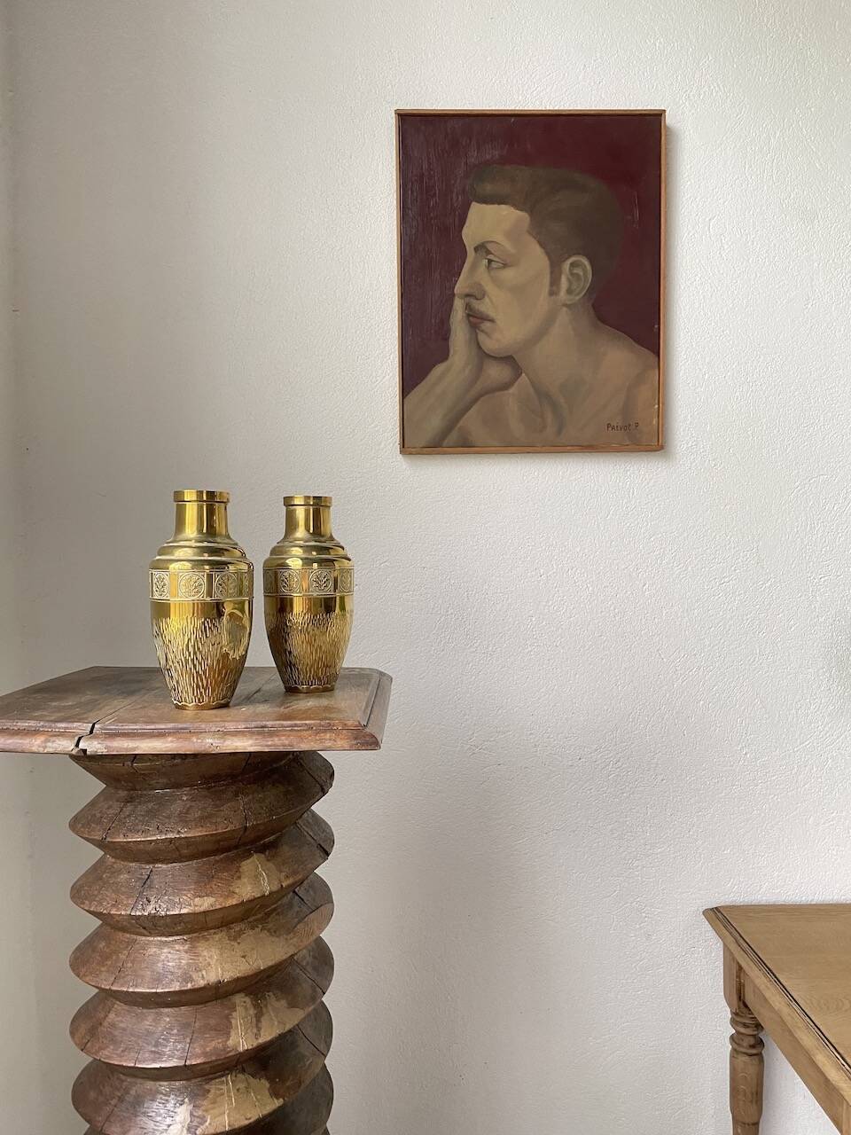 Duo of embossed brass vases