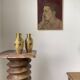 Duo of embossed brass vases