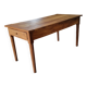 Old farmhouse table made of solid walnut wood.