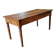 Old farmhouse table made of solid walnut wood.