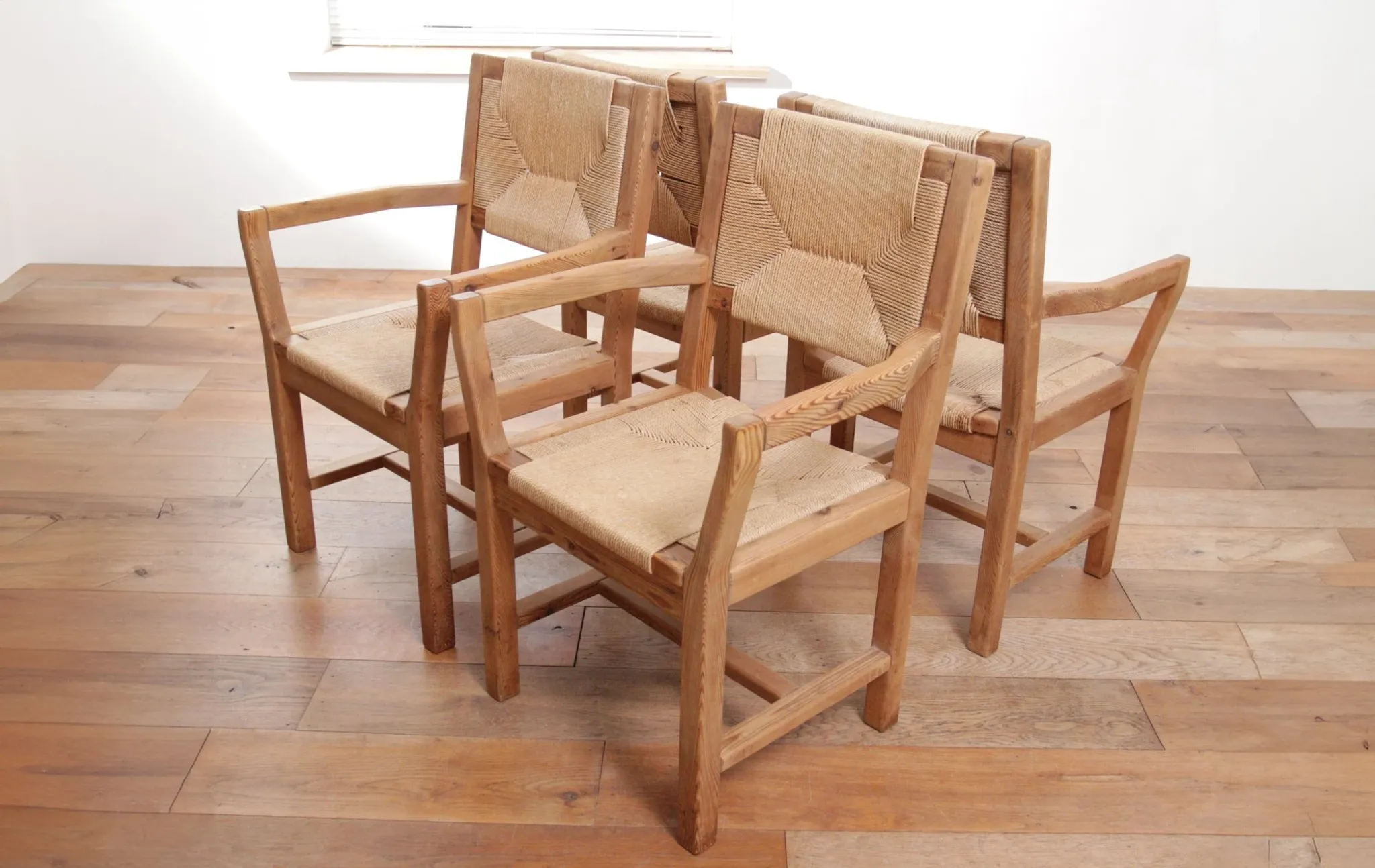 Set of four mid-century modern Danish dining chairs papercord solid pine