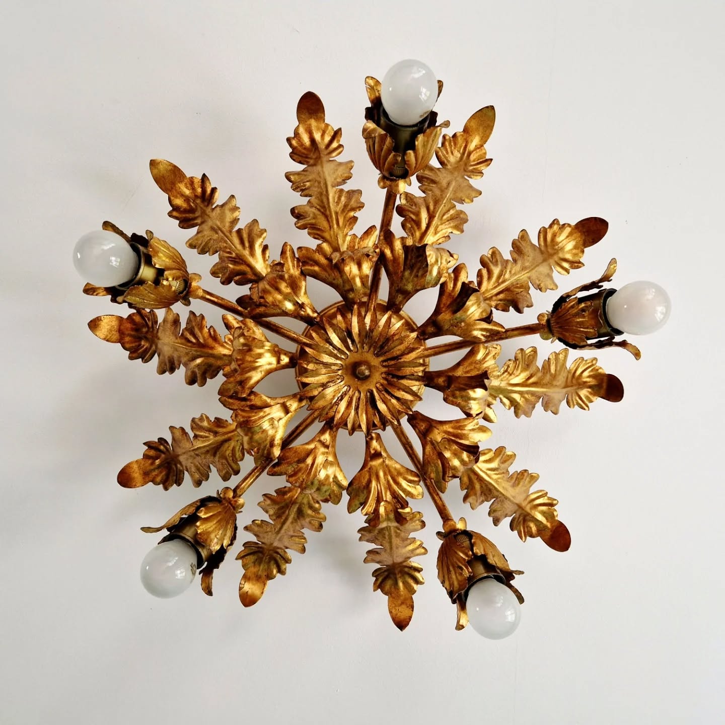 Italian floral ceiling light in gilded metal, 1970s.
