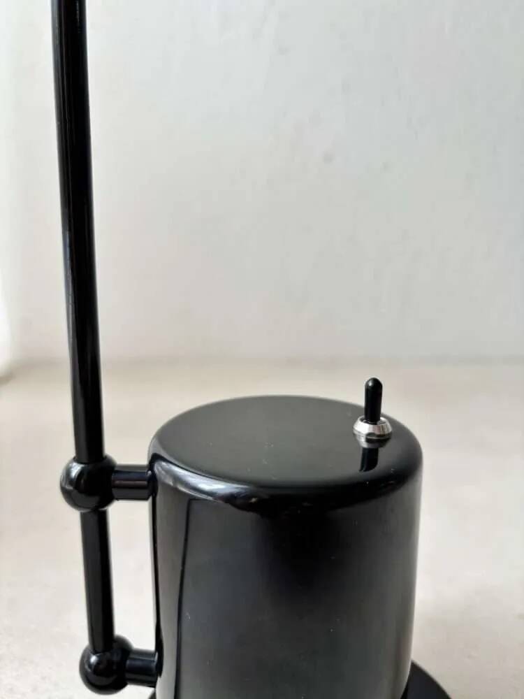 Minimalist Memphis design arc table lamp from the 80s.