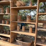 Large antique workshop furniture with drawers and shelves.
