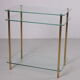 Hollywood Regency side table with gold-colored legs