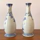 Old pair of blue and white porcelain vases from Japan - in good condition.