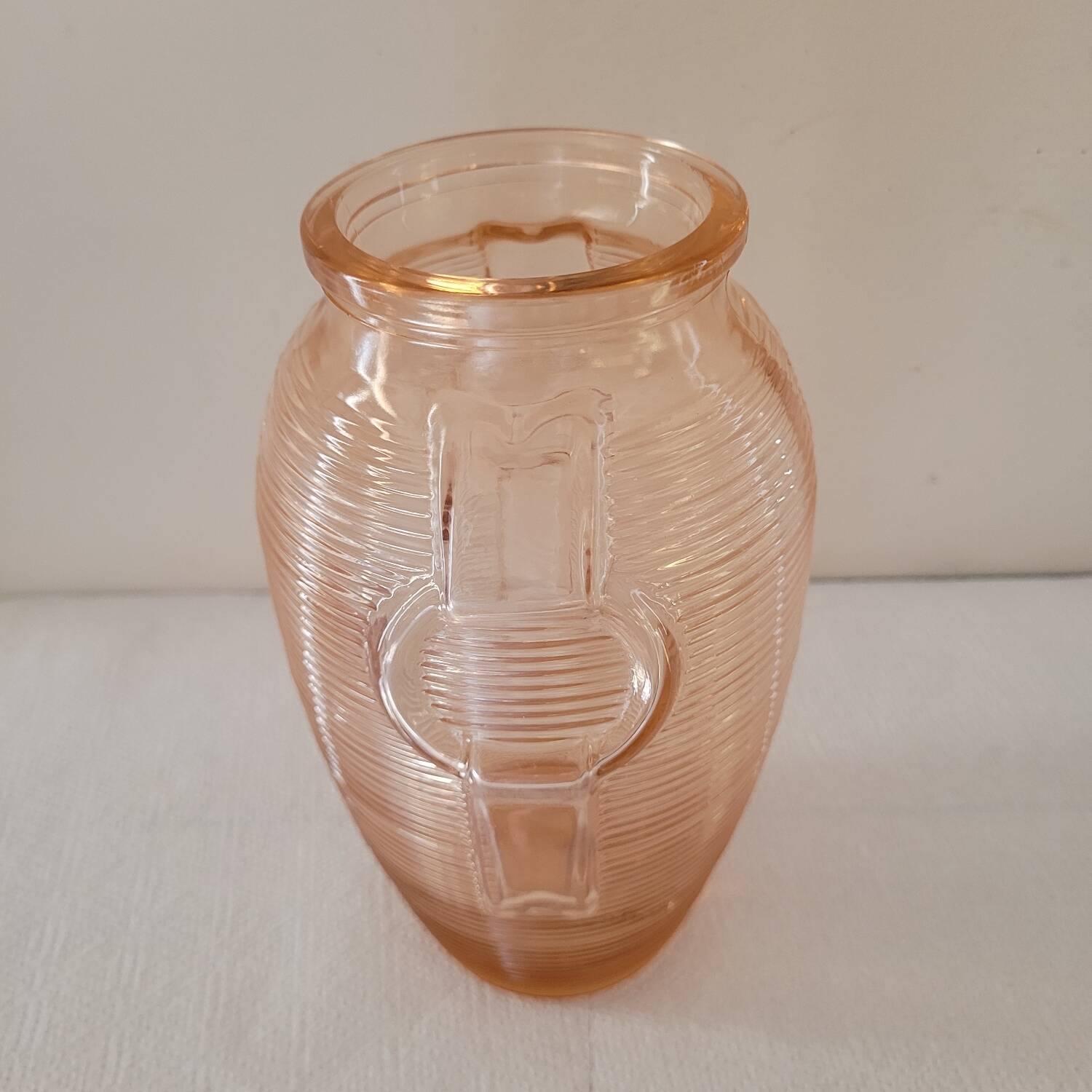 Salmon-colored Art Deco pressed glass vase