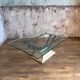 Table basse en verre et métal patine antique
