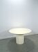 Ronde creme eettafel met geribbelde poot