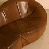 "Pumpkin" 3-seater canapé in patinated brown leather by Pierre Paulin for Arti.