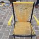 Folding chair in red scoubidou and black metal structure