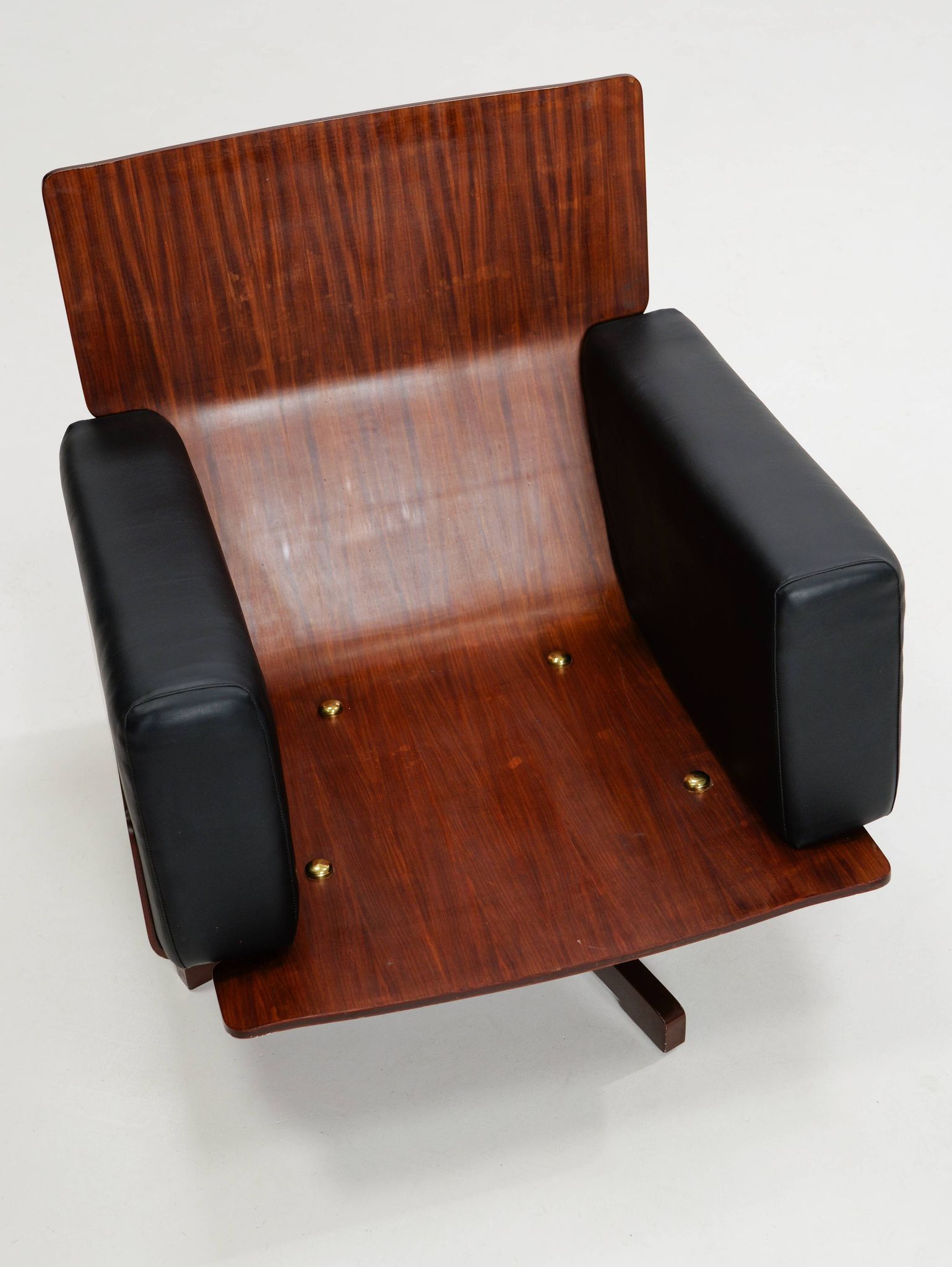 Swivel rosewood model 401 armchair by Menilio Taro for Cinova, 1960s