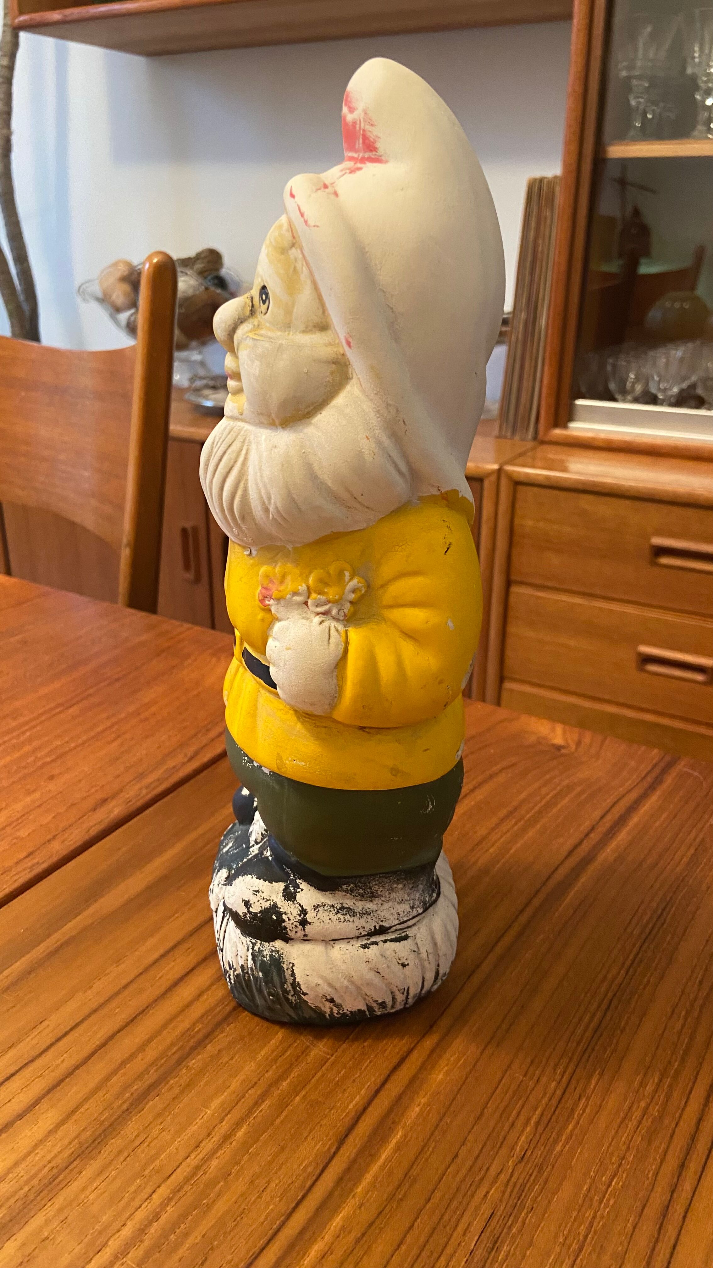 Ancient terracotta garden gnome