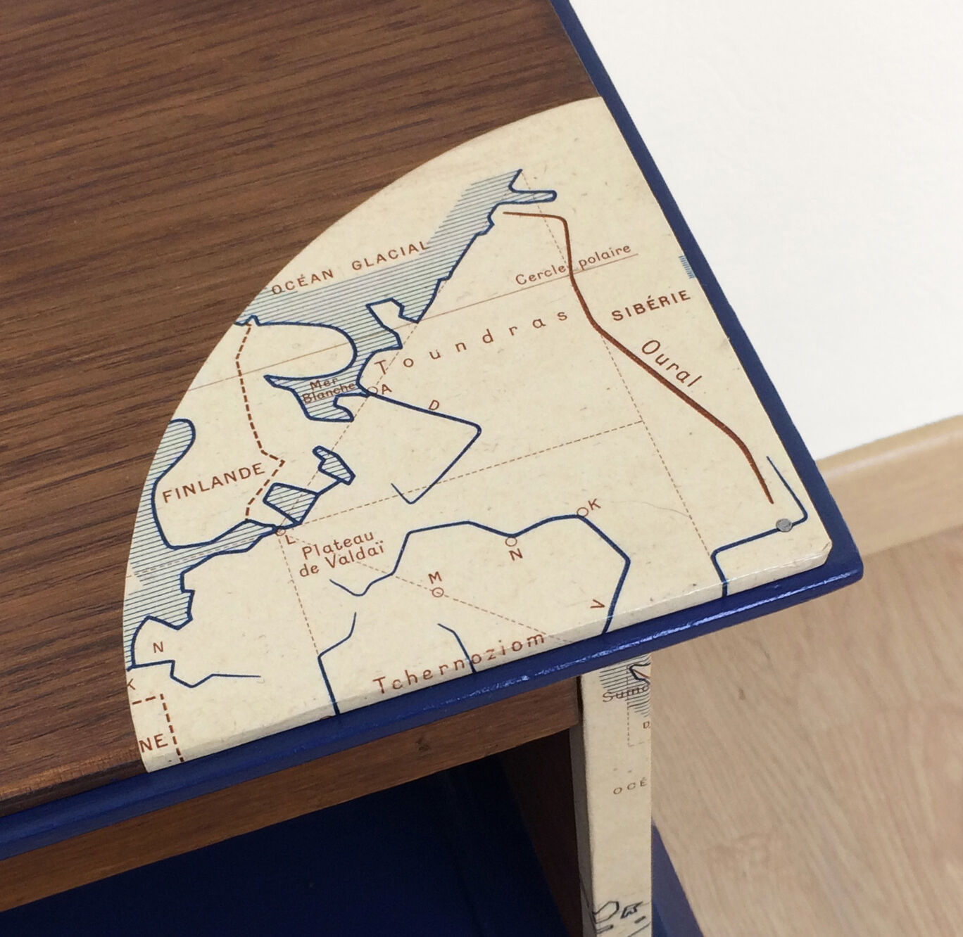 Blue bedside table compass feet