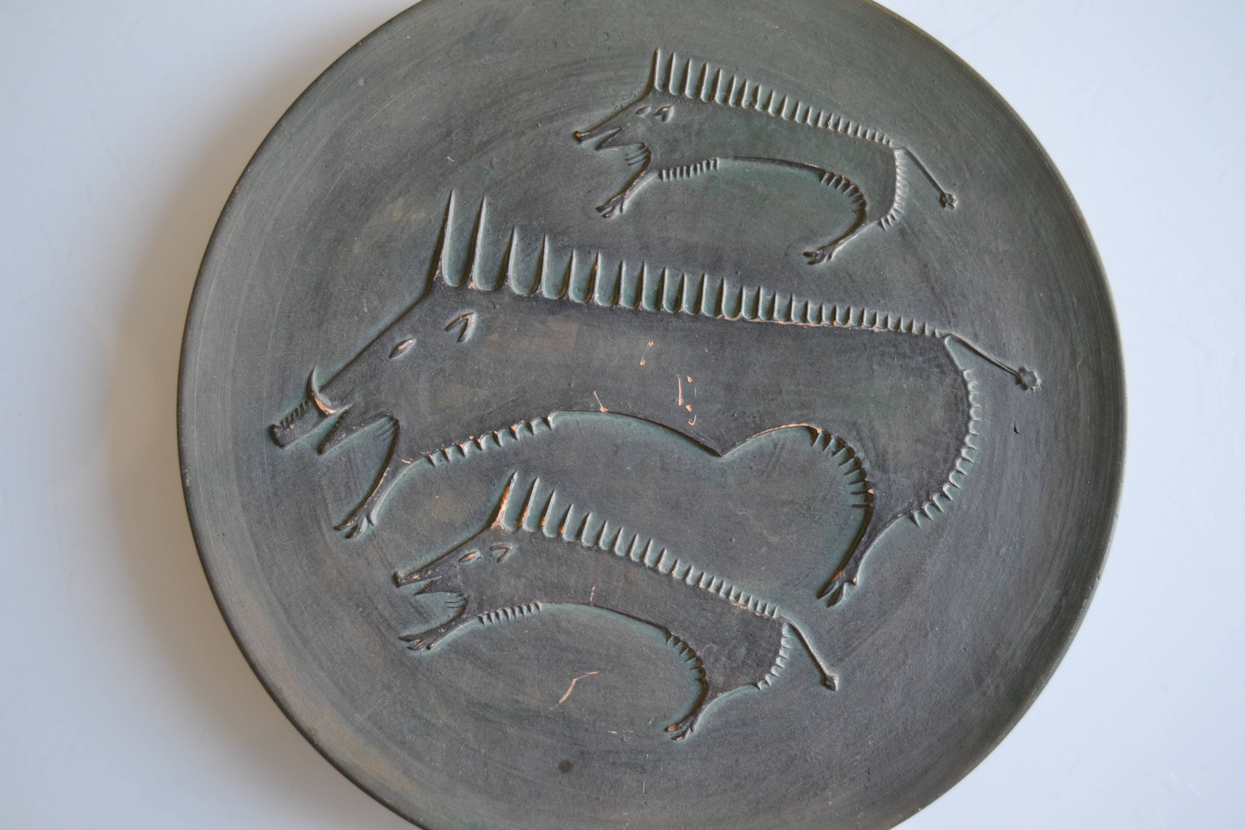 Ceramic wall plate attributed to Wim Mühlendyk