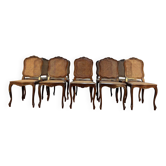 Suite de 10 chaises de style Louis XV en noyer et cannage