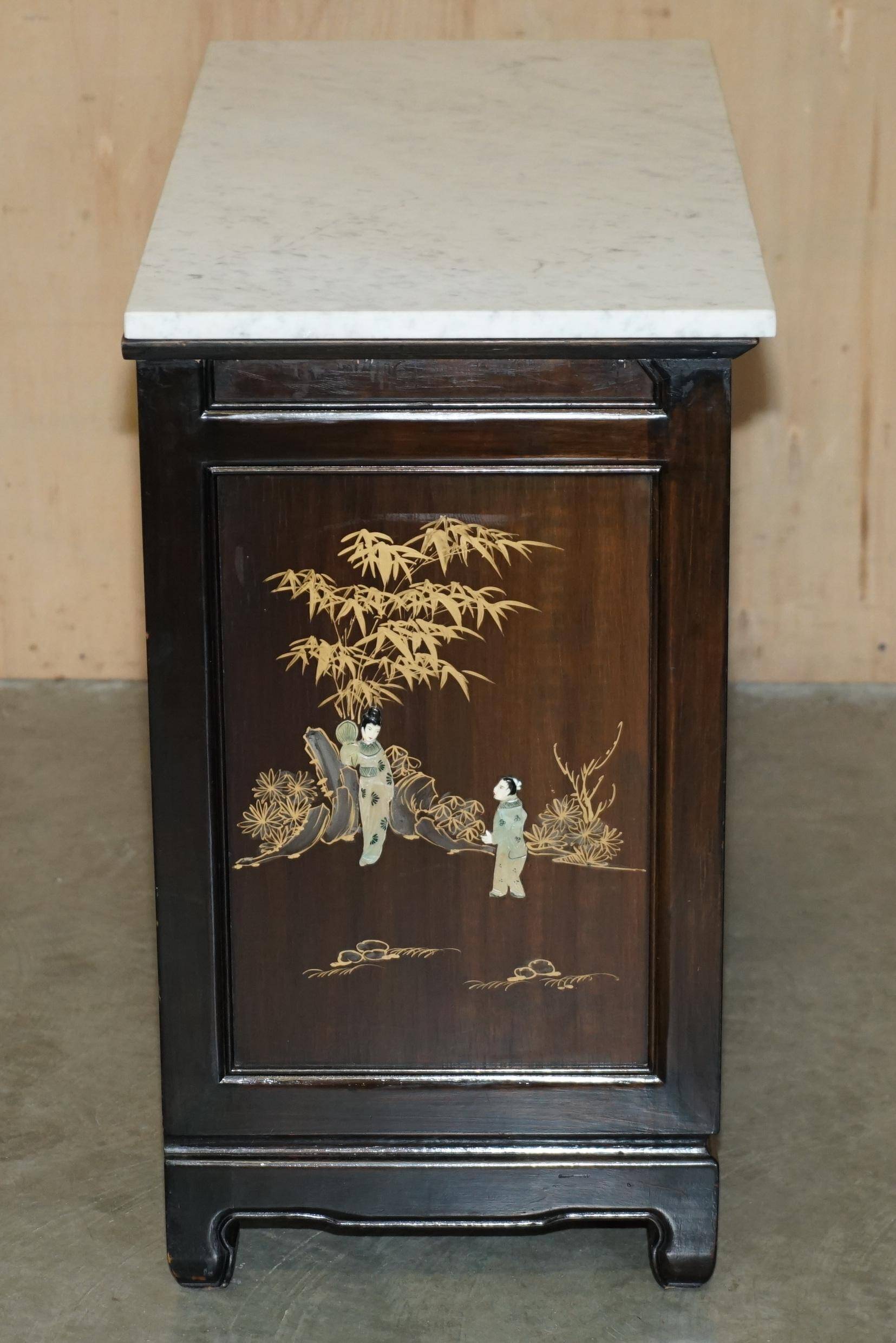 Antique Chinese commode carved in steatite with a marble top.
