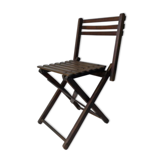 Old folding wooden chair for children