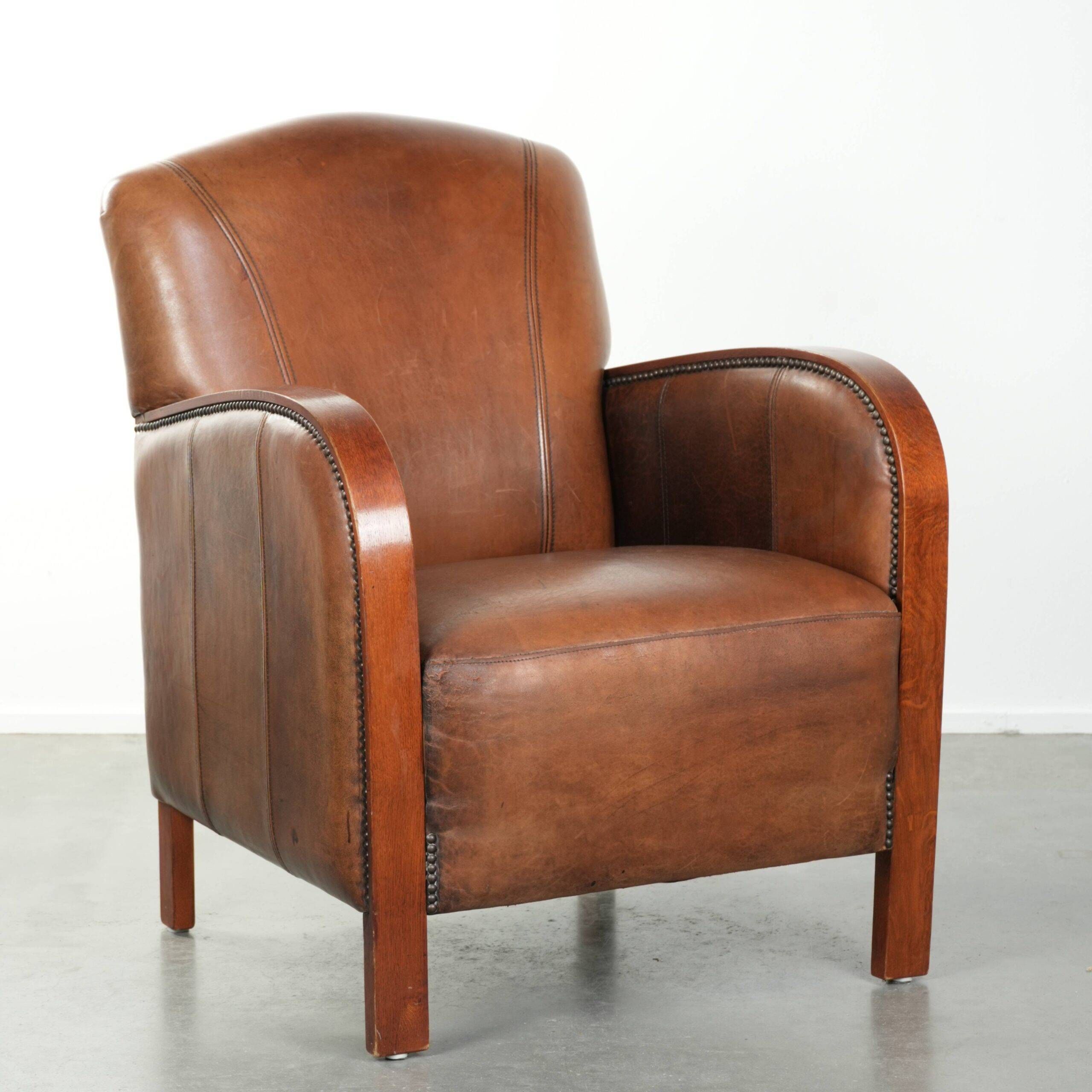 Sheepskin armchair in Art Deco style with wooden armrests