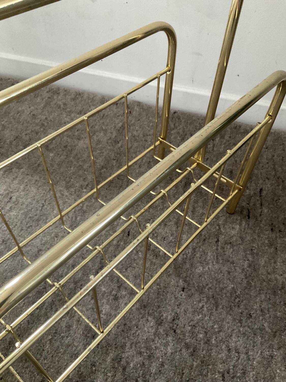 Vintage magazine holder in gold metal