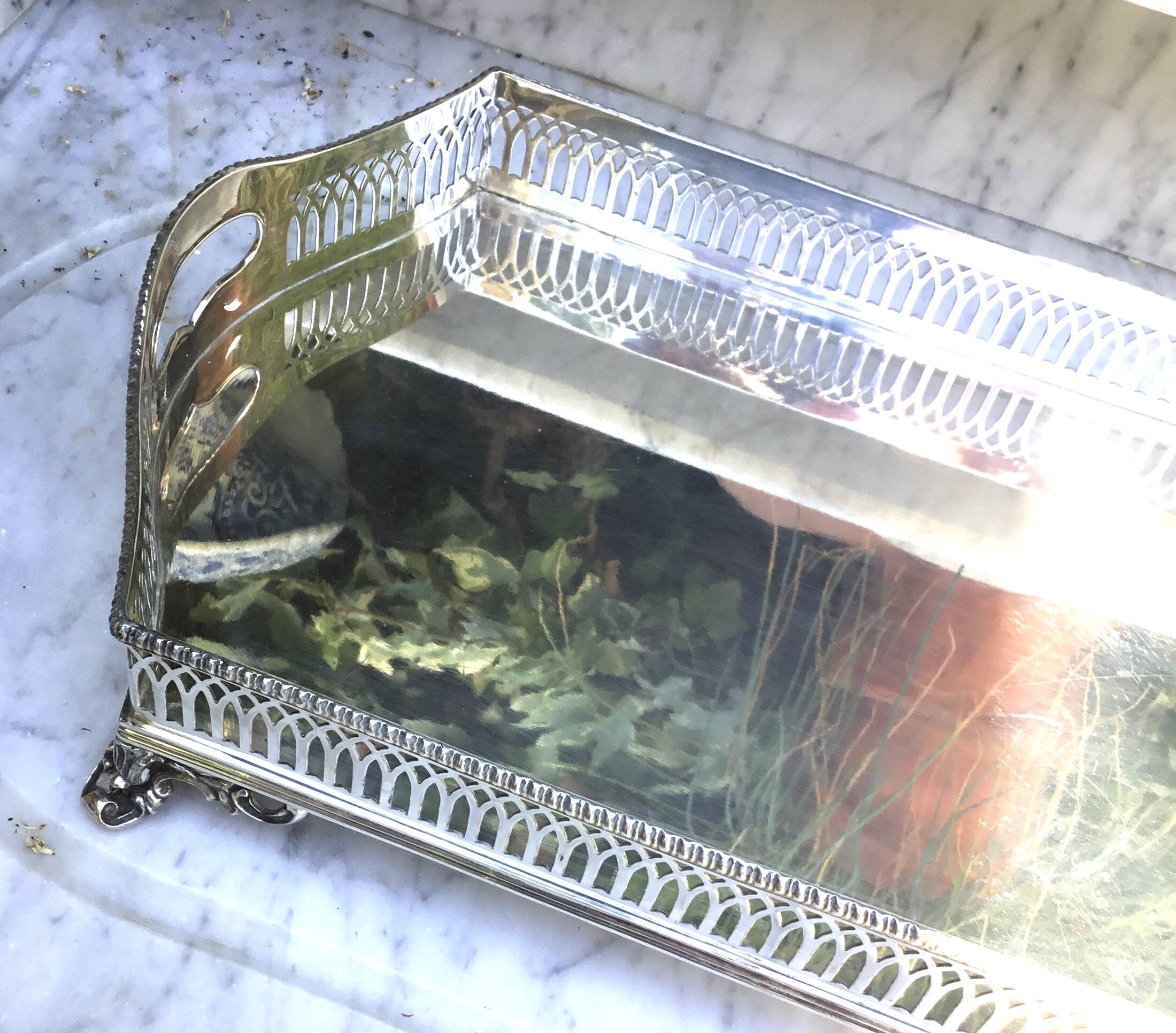 Important silver-plated metal table in the Louis XVI style.