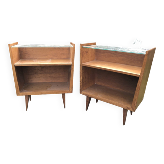 Duo of vintage bedside tables in solid oak with glass top with compass feet.